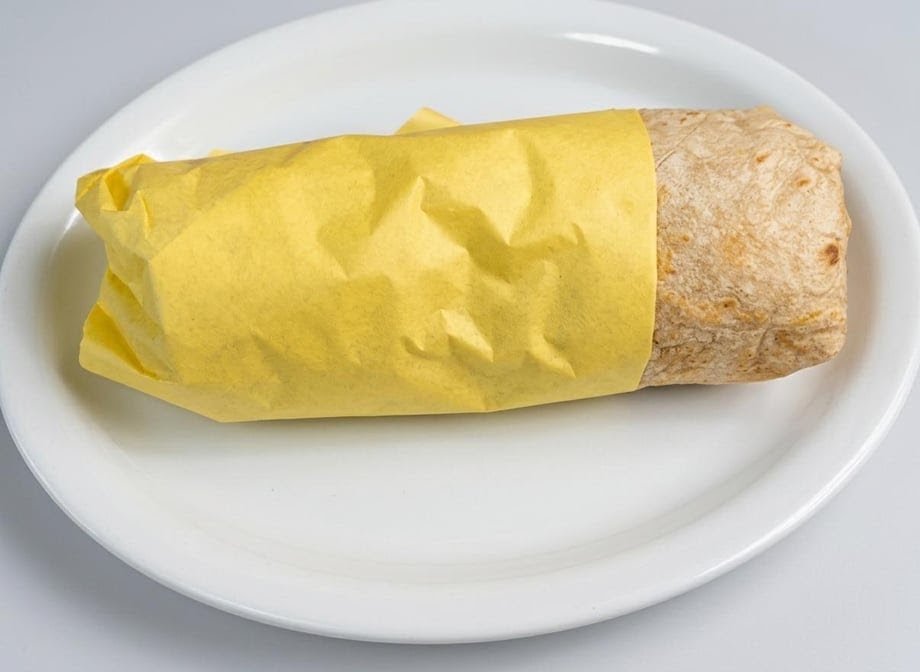 Printed menu featuring burritos and salads